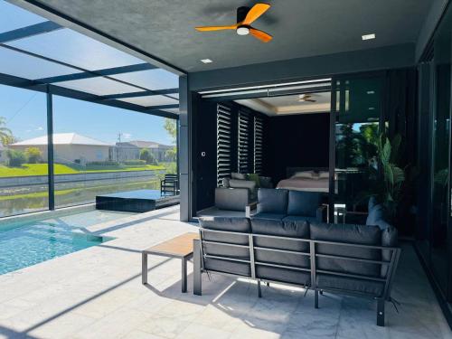 Modern Luxe Home - pool jacuzzi and channel view - image 3
