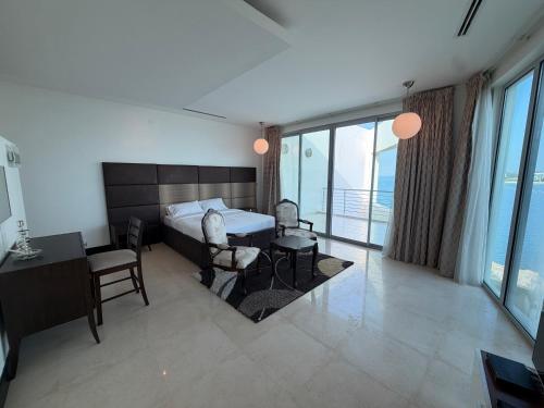 Elegant 5BR Villa with Private Pool & Private Beach Access Durrat Al Bahrain in Sakhir