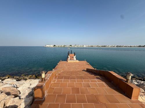 Elegant 5BR Villa with Private Pool & Private Beach Access Durrat Al Bahrain in Sakhir