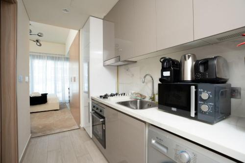 Nasma Luxury Stays - Stylish living in Azizi Riviera in Nad Al Sheba