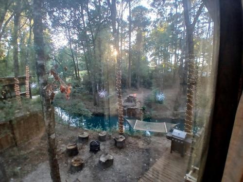Tranquil Creekside Container with Private Waterfall Near Renaissance Festival | Magnolia, Texas in Magnolia (TX)