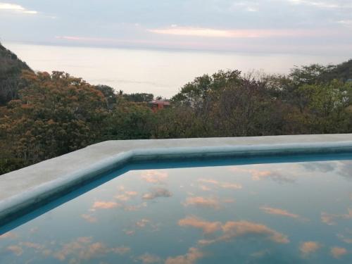 Peldbaseins, Macondo Guest House Beach in Playa Estacahuite