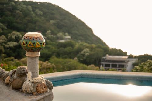 Peldbaseins, Macondo Guest House Beach in Playa Estacahuite