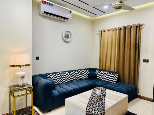Modern 1BR Apartment in Zeta Mall Islamabad Rooftop Pool & Mall Access - image 12