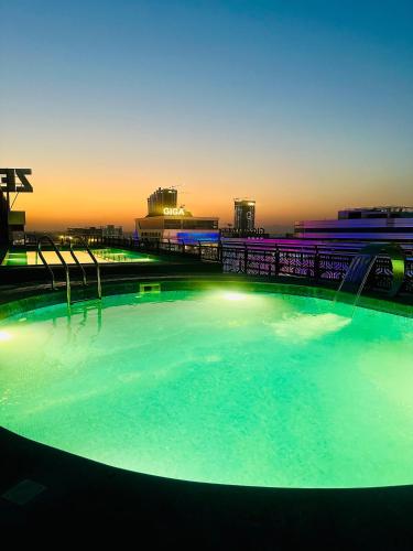 Modern 1BR Apartment in Zeta Mall Islamabad Rooftop Pool & Mall Access - image 7