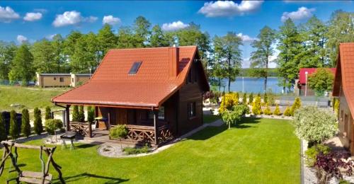 Exterior view of Osada Skorupki - Caloroczne domki Mikolajki Mazury
