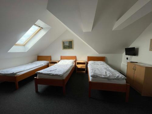 Penzion U Kašných Room Type - Classic Quadruple Room