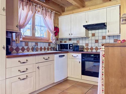 Kitchen, Chalet La Suisse Normande by Interhome in Les Diablerets
