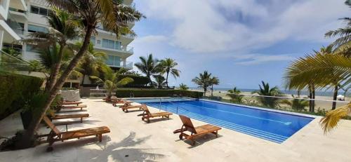 Apartment in Beachfront Building with Resort Pools near Historic Center Cartagena