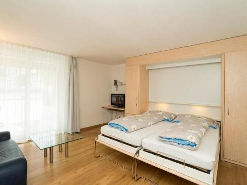 Apartment Chesa Quadrella by Interhome