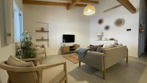 Koplietošanas atpūtas telpa ar TV, Casas do Campo in São Marcos do Campo
