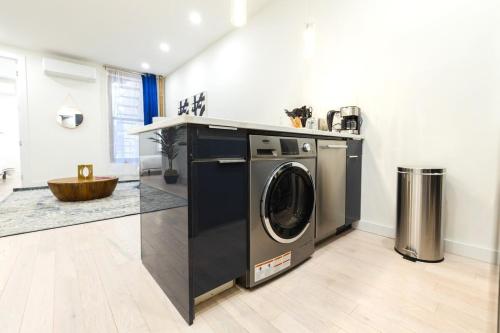 317-3D I NEW Modern 1BR W&D Walk to Central Park - image 2