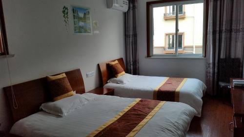 Bihai Dream Garden Farm House Located in Zhujiajian, Bihai Dream Garden Farm House is a perfect starting point from which to explore Zhoushan. The property has everything you need for a comfortable stay. Service-minded staff will 