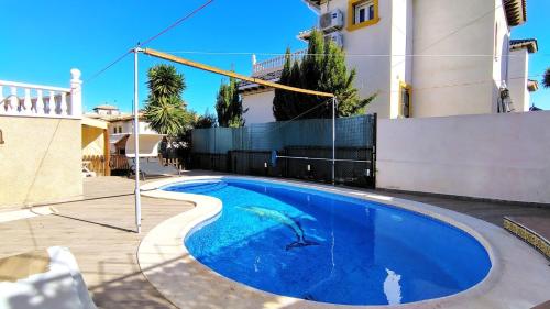 Planta baja con piscina privada chambre d'hôte Punta Prima
