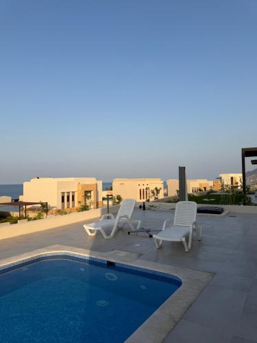 Beach front 414 villa private pool – khách sạn tại As Sifah