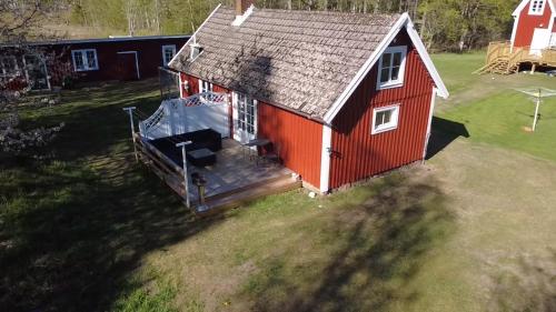 Stuga med sjöutsikt (Stuga med sjoutsikt) in Alšulta