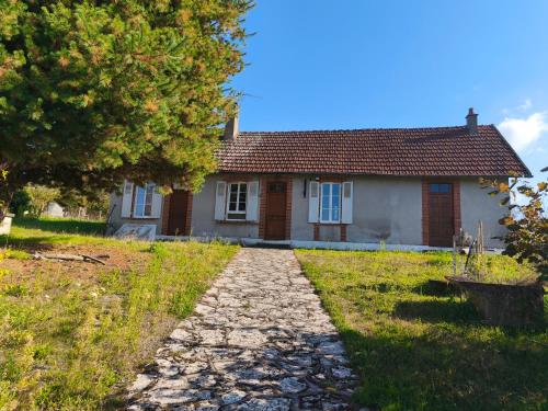Viesnīcas āriene, Maison de plain pied au coeur du village in Ganē Surluāra