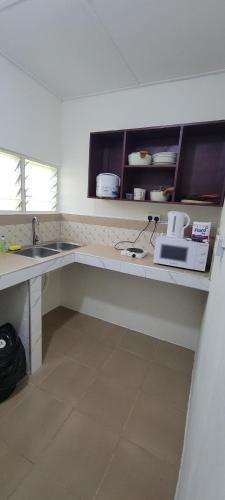 кухня, Lord's Hands Guesthouse Hotel in Winneba
