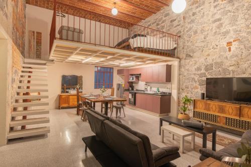 Loft #104 en Centro Histórico con Terraza Compartida y Patio Privado