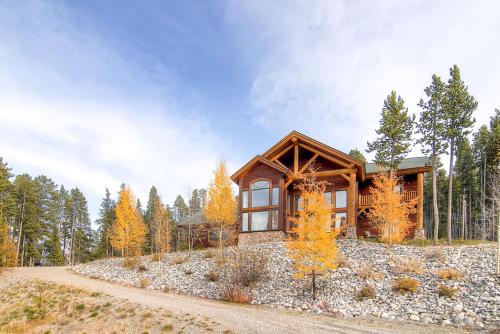 Experience mountain living at Timber Heights Lodge with a private hot tub in Other
