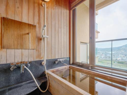 Bathroom, 天然温泉ひなたの宿日南宮崎 in Nichinan
