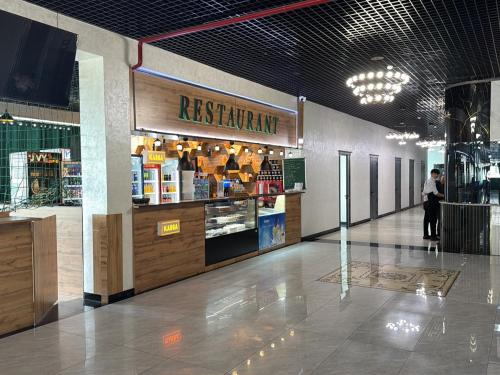 Restaurant, Yangisaroy Hotel in Sariasiya