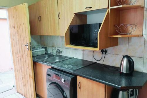 Kitchen, Budget Stays at Olivia Pines Guesthouse in Krugersdorp