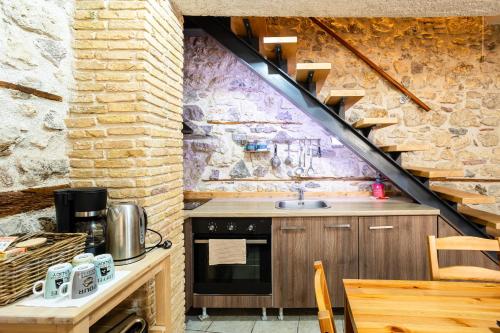 virtuve, Limni Stone Apartments in Limni (Evvoia)