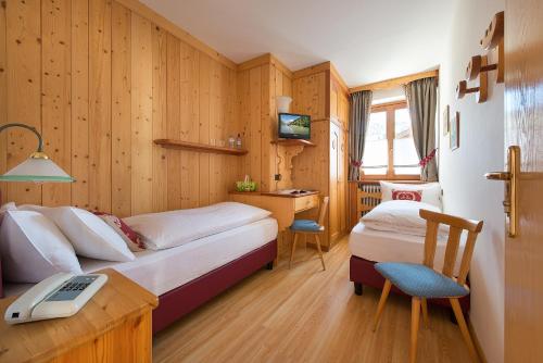 Hotel Posta Ideally located in the prime touristic area of Livigno, Hotel Posta promises a relaxing and wonderful visit. The hotel has everything you need for a comfortable stay. Take advantage of the hotels fac