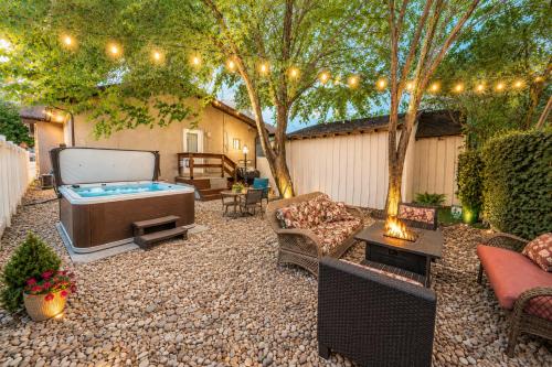 . Relaxing hot tub, games, & BBQ, near downtown fun!