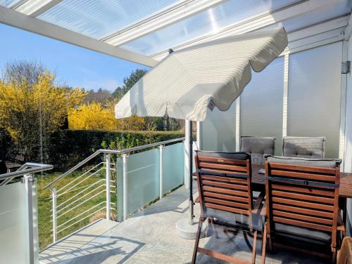 Ferienhaus am See mit Ruderboot in Mustin