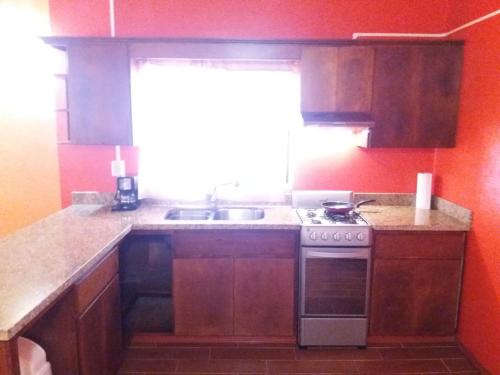 Kitchen, Adanesne Apartments in Valle Dorado