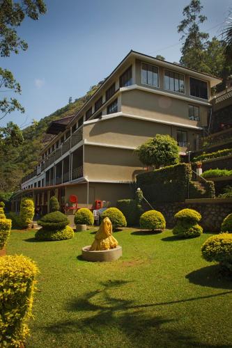Kert, Abad Copper Castle Hotel in Kannan Devan Domb