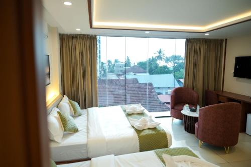 Hotel Calicut Beach in Manachira Tér