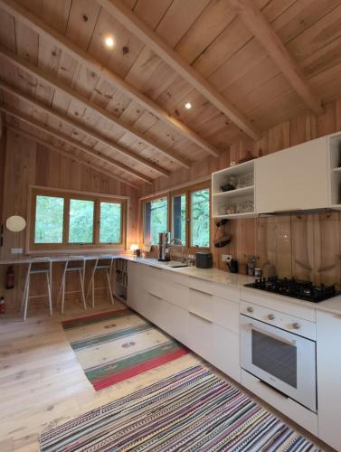 Villa surf-yoga with private lush garden & sandy stream in Mezos