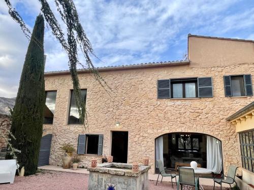 Casa familiar entre olivos, con patio y barbacoa gîte à louer Mosén Juan