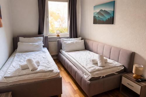 5-Personen Apartment ideal für Monteure - Einzelbetten, Self Check-in, Küche, Waschmaschine (5-Personen Apartment ideal fur Monteure - Einzelbetten, Self Check-in, Kuche, Waschmaschine) in Mersebourg
