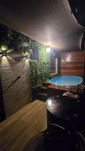 Apartamento com vista para piscina com hidromassagem e aquecedor in Cataguases