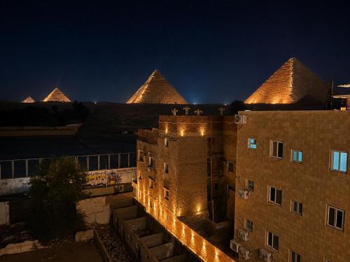 Dima Plaza Pyramids View - image 3