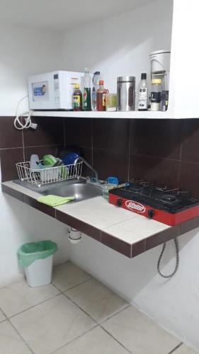 Kitchen, RECAMARA INDEPENDIENTE con CAMA MATRIMONIAL AIRE ACONDICIONADO Y BANO EXCLUSIVO in Santa Rita 1
