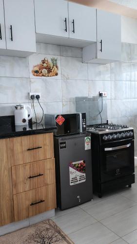 virtuve, Leila's Cozy Meru Staycation in Meru