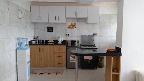 virtuve, Leila's Cozy Meru Staycation in Meru