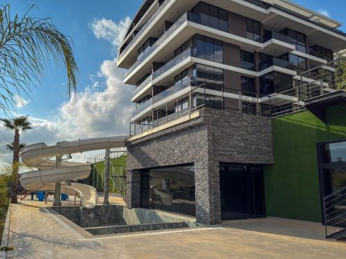 Qoople New Level Cleopatra Family apartments - Dinek