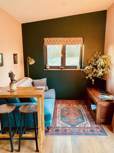 The Apple Shed - cosy cabin nestled in orchard in rural Devon – khách sạn tại Pathfinder