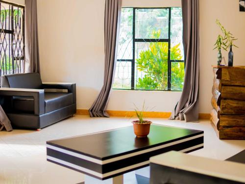 Pubi/sohvabaar, Breezy Lodge in Weru Weru