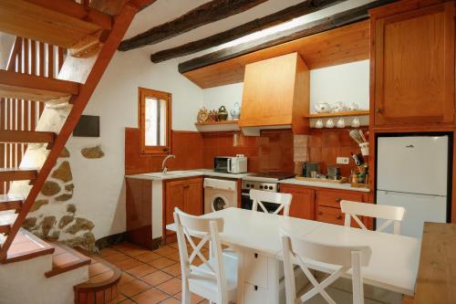 Masia Olivera in Can Cartro