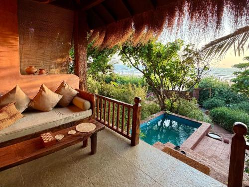 Beach, Palm Grove Beach Resort in Morjim