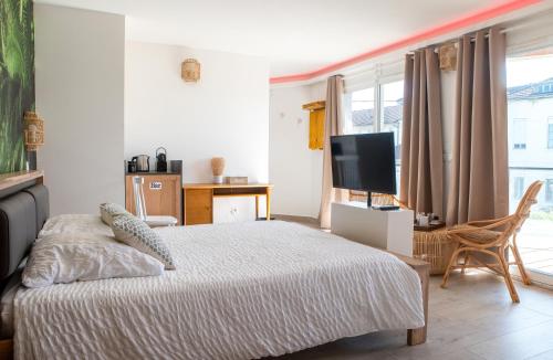 Suite Aracari, clim, balneo, terrasse - Parc des Oiseaux in Villars-les-Dombes