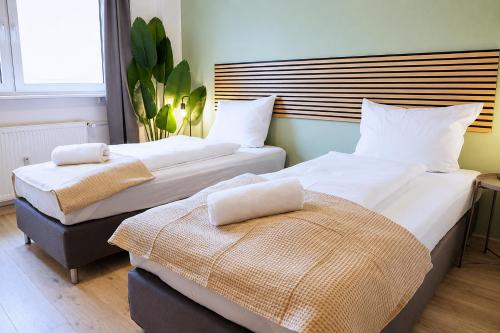 Cozy Apartment I 5x Einzelbetten I Küche I WIFI I HD TV I Balkon I Erdgeschoss I Self Check-in in Halle an der Saale, Deutschland