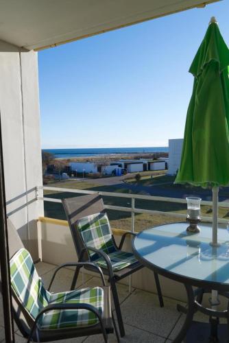 Inselblume 74 - Ferienwohnung mit Balkon am Yachthafen in Sudstrandpromenade